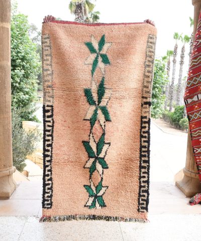 a large rug with a green leaf on it. il_fullxfull.6017516922_iea5.jpg