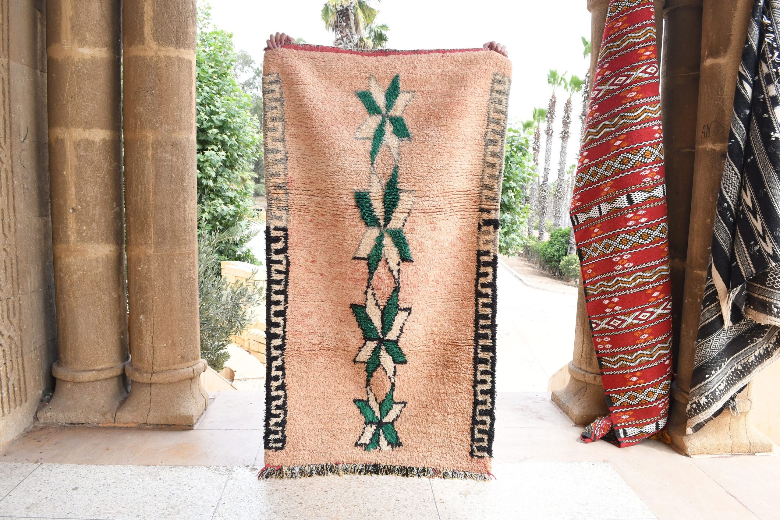 a large rug with a green leaf on it. il_fullxfull.6017516922_iea5.jpg