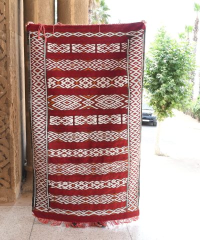 a red and white rug. il_fullxfull.6017552432_ih6k.jpg