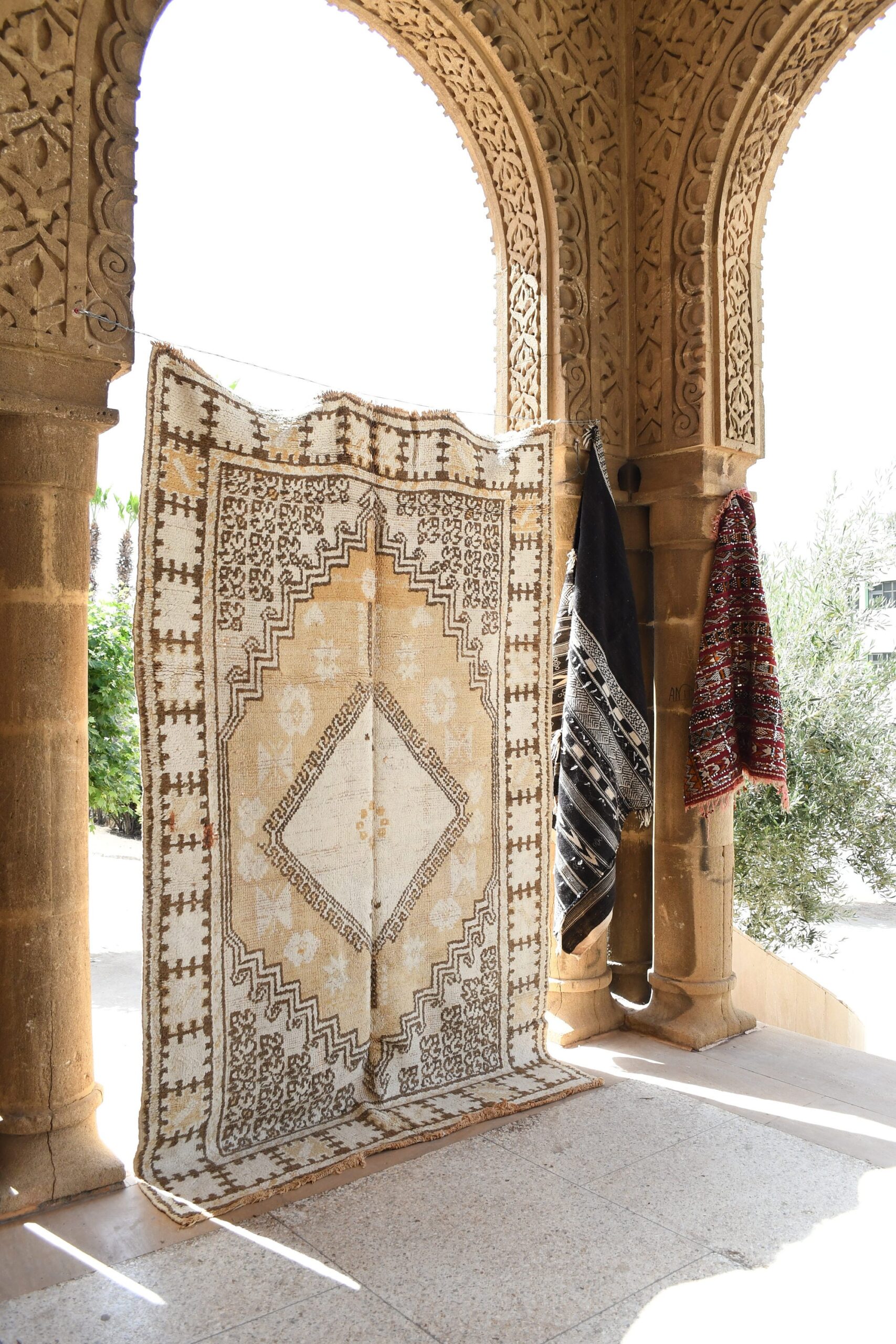 a large rug is hanging on a wall. il_fullxfull.6021276472_cgy5.jpg