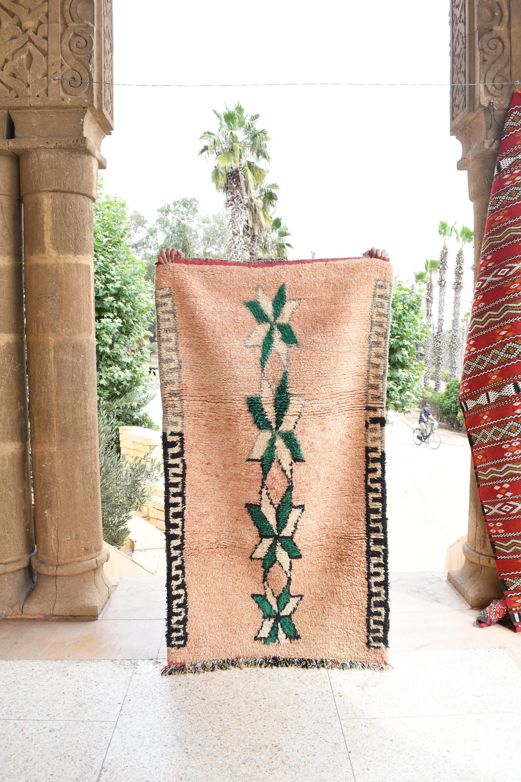 a large rug with a green plant on it. il_fullxfull.6021336804_l0gw.jpg