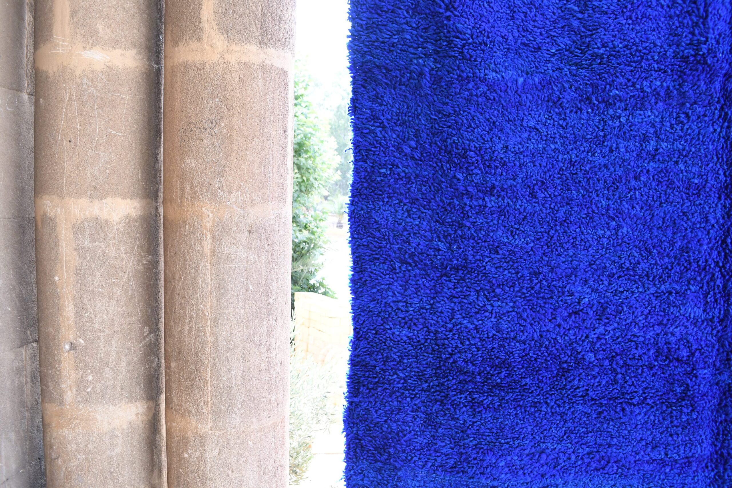 a blue rug on a wooden floor. il_fullxfull.6021350476_ar7o.jpg