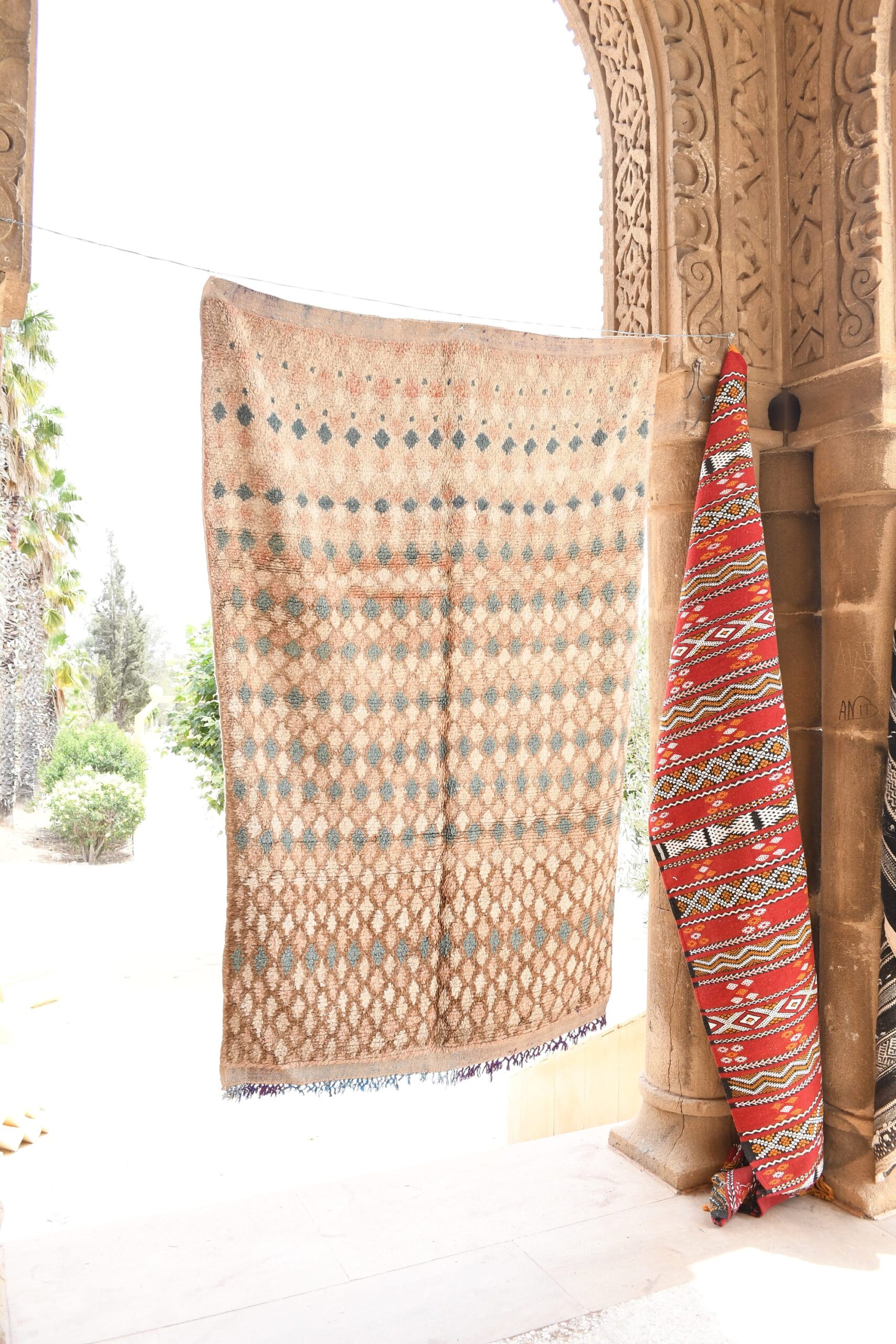 a woman sitting on a chair in a doorway. il_fullxfull.6021359406_r6z0.jpg