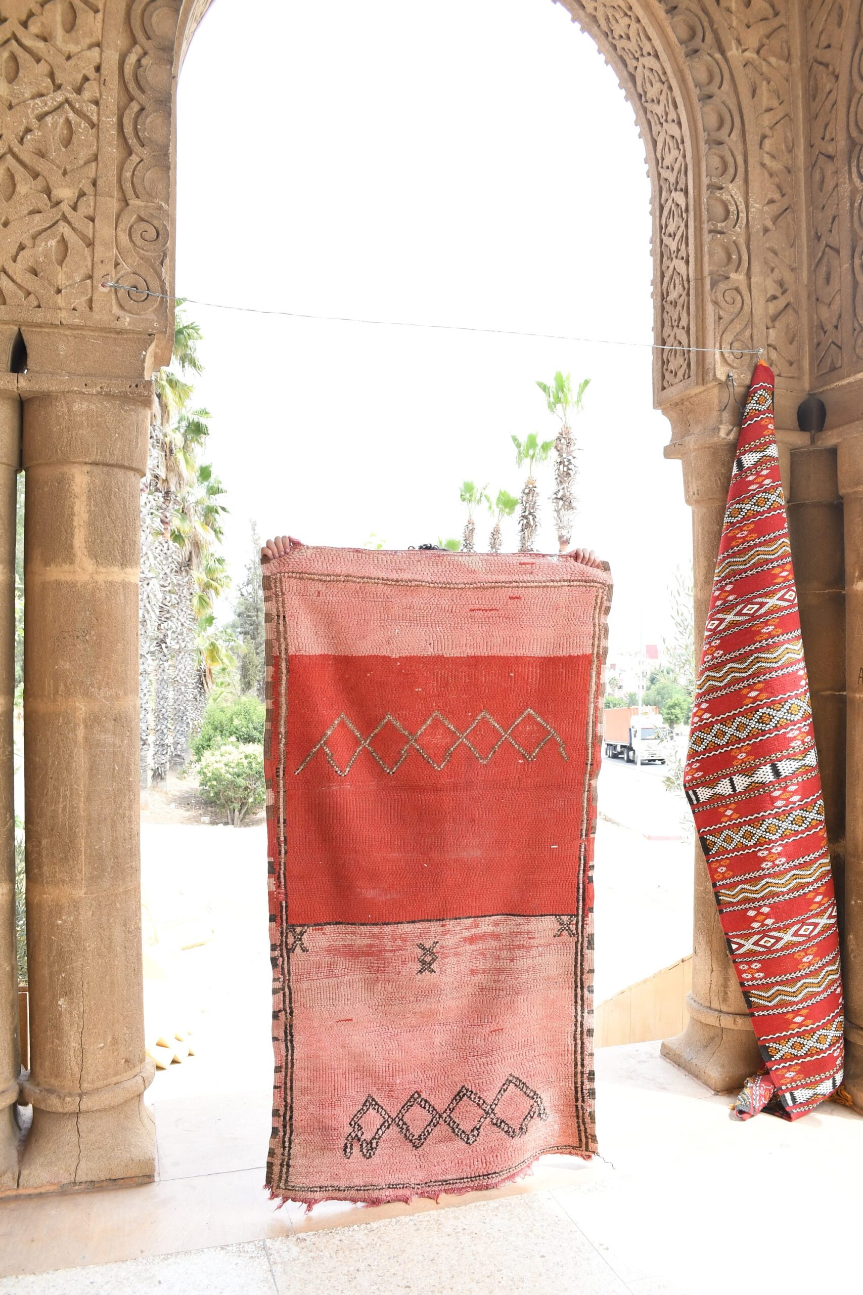 a red rug hanging on a wall. il_fullxfull.6021368940_6jbg.jpg