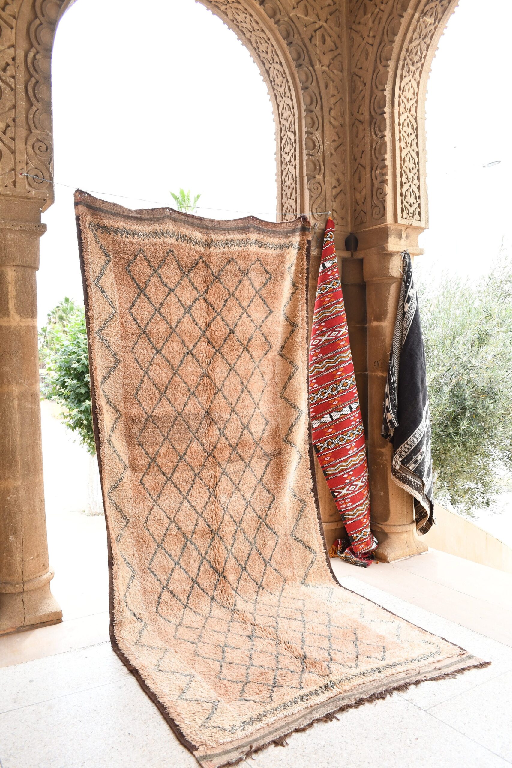 a rug is hanging on a wall. il_fullxfull.6023052548_4wfh.jpg