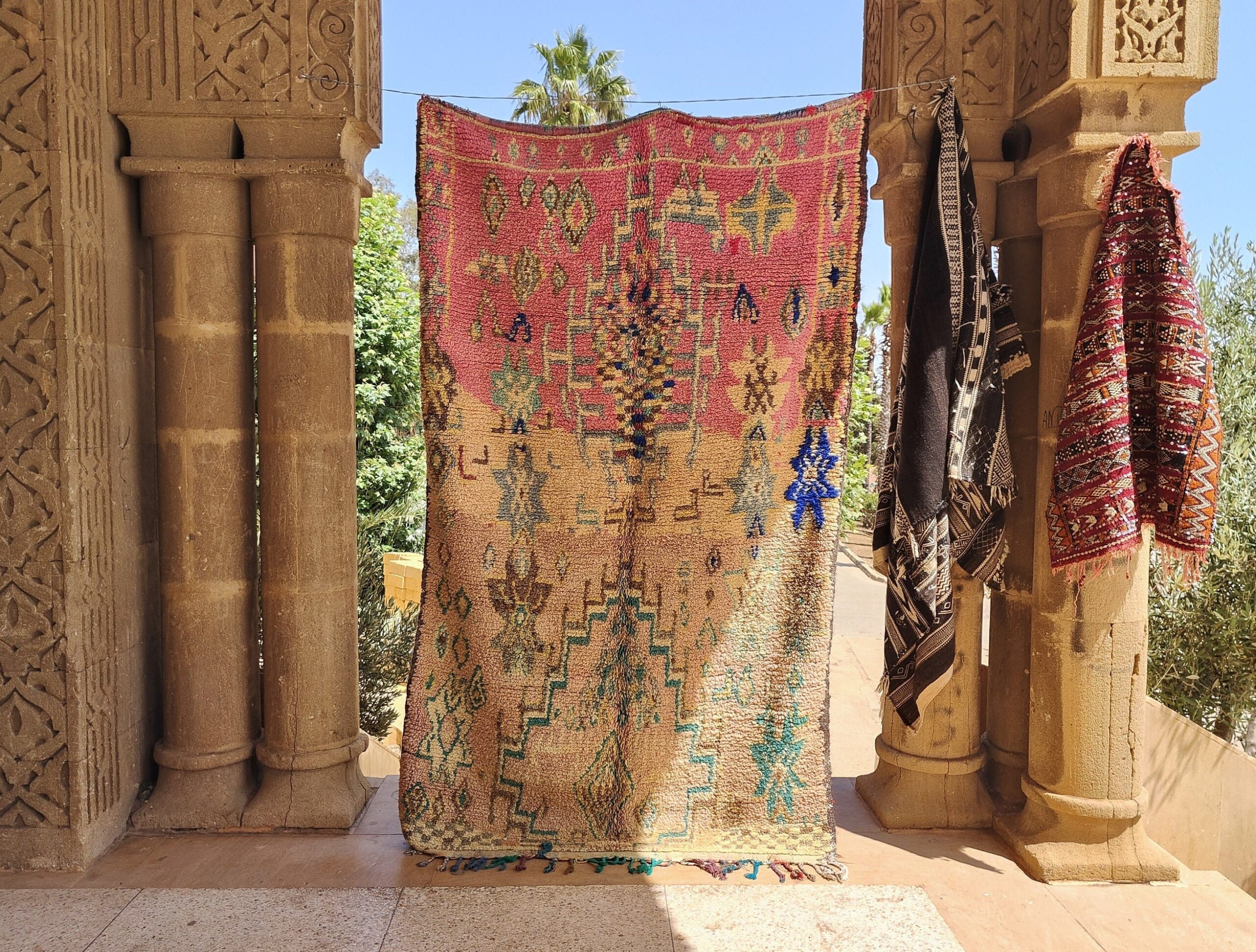 a colorful rug hanging on a wall. il_fullxfull.6023106994_90jy.jpg