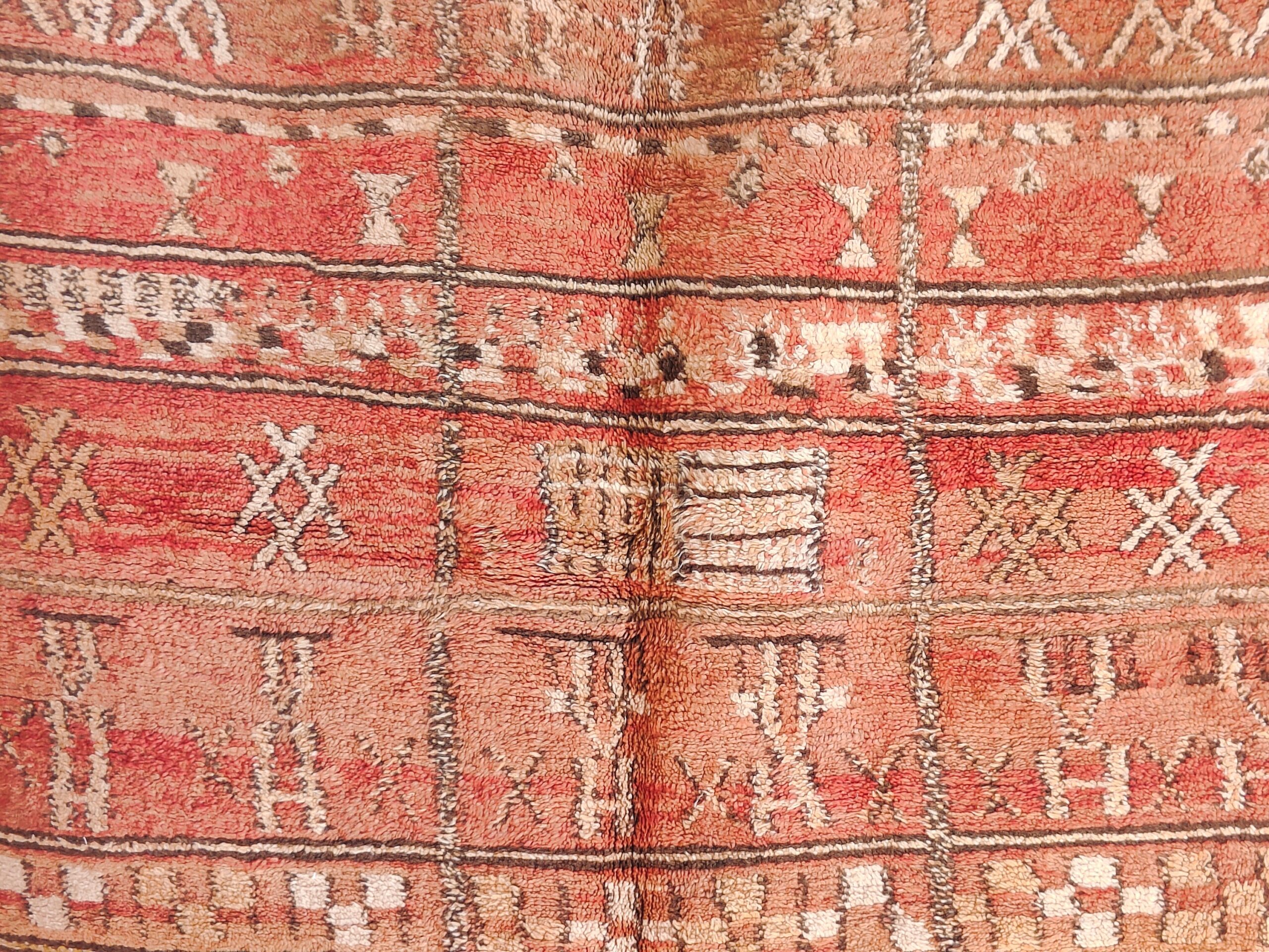 a large antique moroccan rug. il_fullxfull.6023111292_bo64.jpg