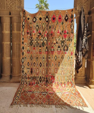 a colorful rug is on display in a room. il_fullxfull.6023117414_n2al.jpg