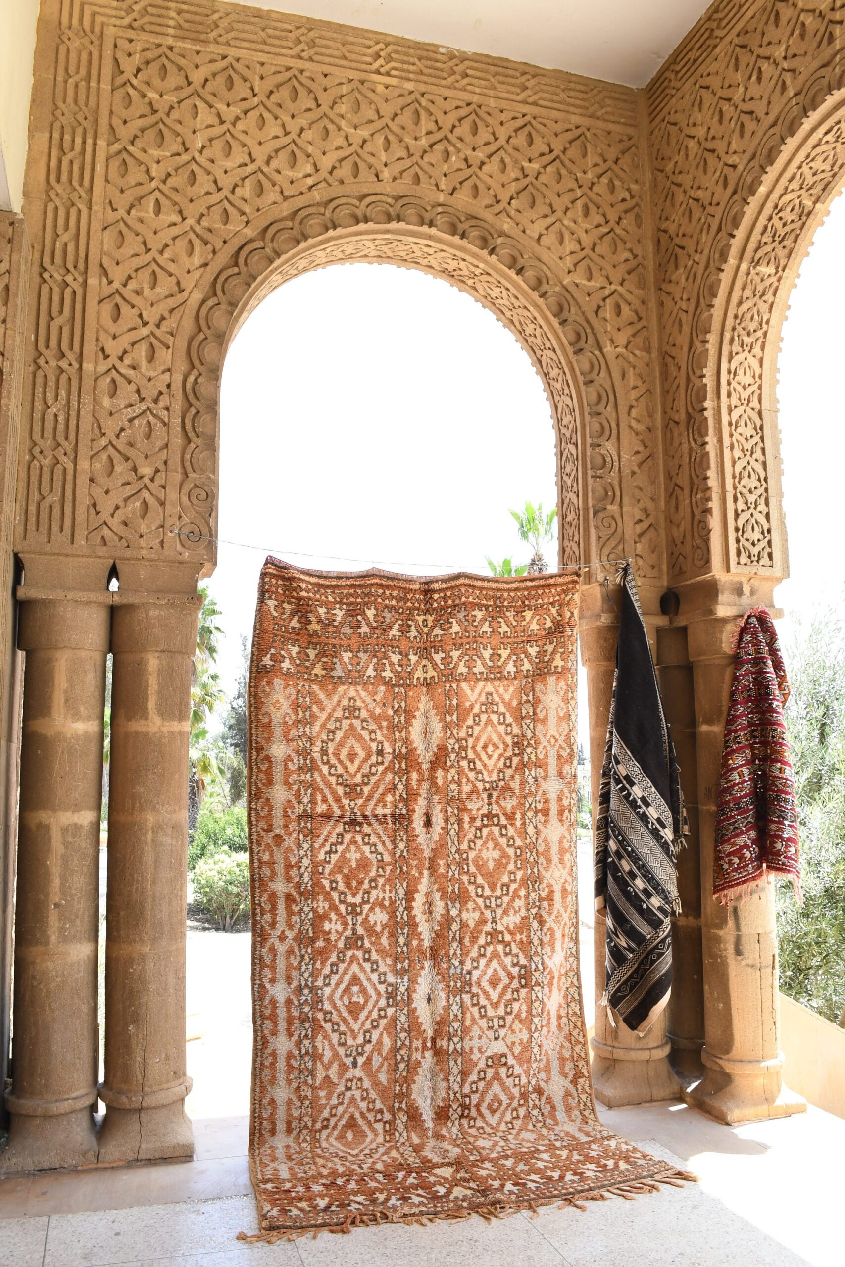 a large rug is on display in a room. il_fullxfull.6023133914_mwew.jpg