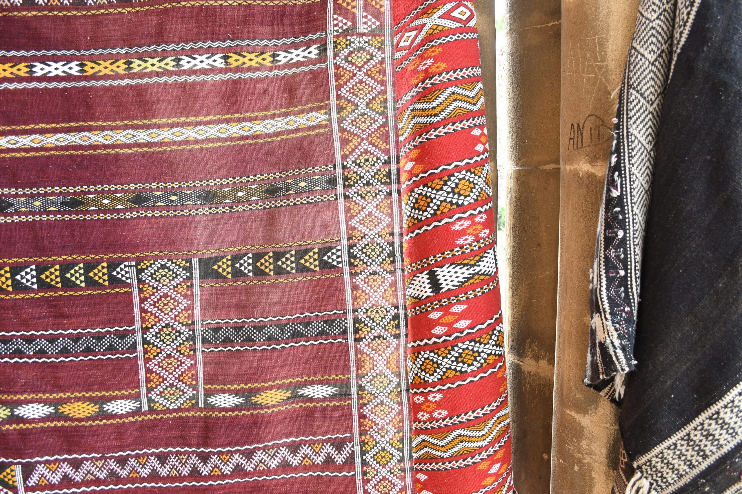 a pile of colorfully colored rugs. il_fullxfull.6025854332_t10u.jpg