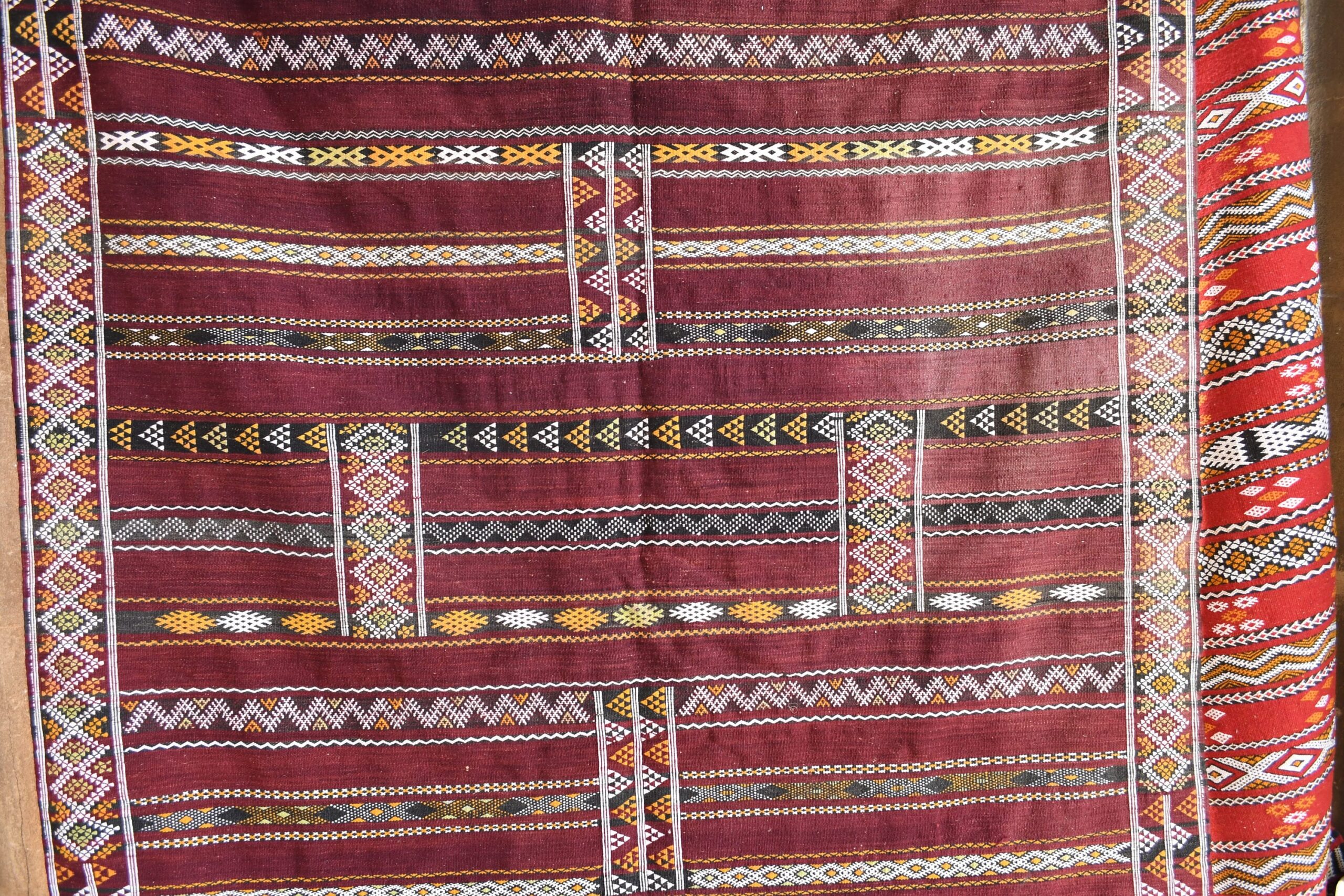 a red and white patterned dress with a long sleeve. il_fullxfull.6025854568_cdzs.jpg