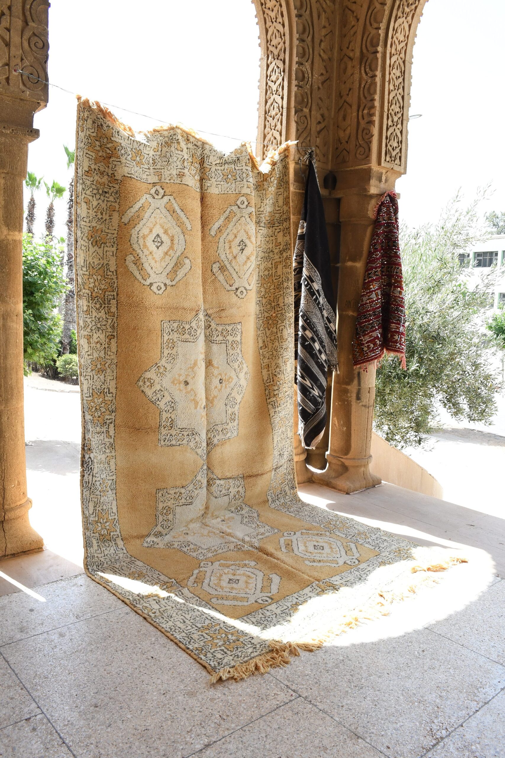 a large rug is hanging on a wall. il_fullxfull.6025857030_o9tl.jpg