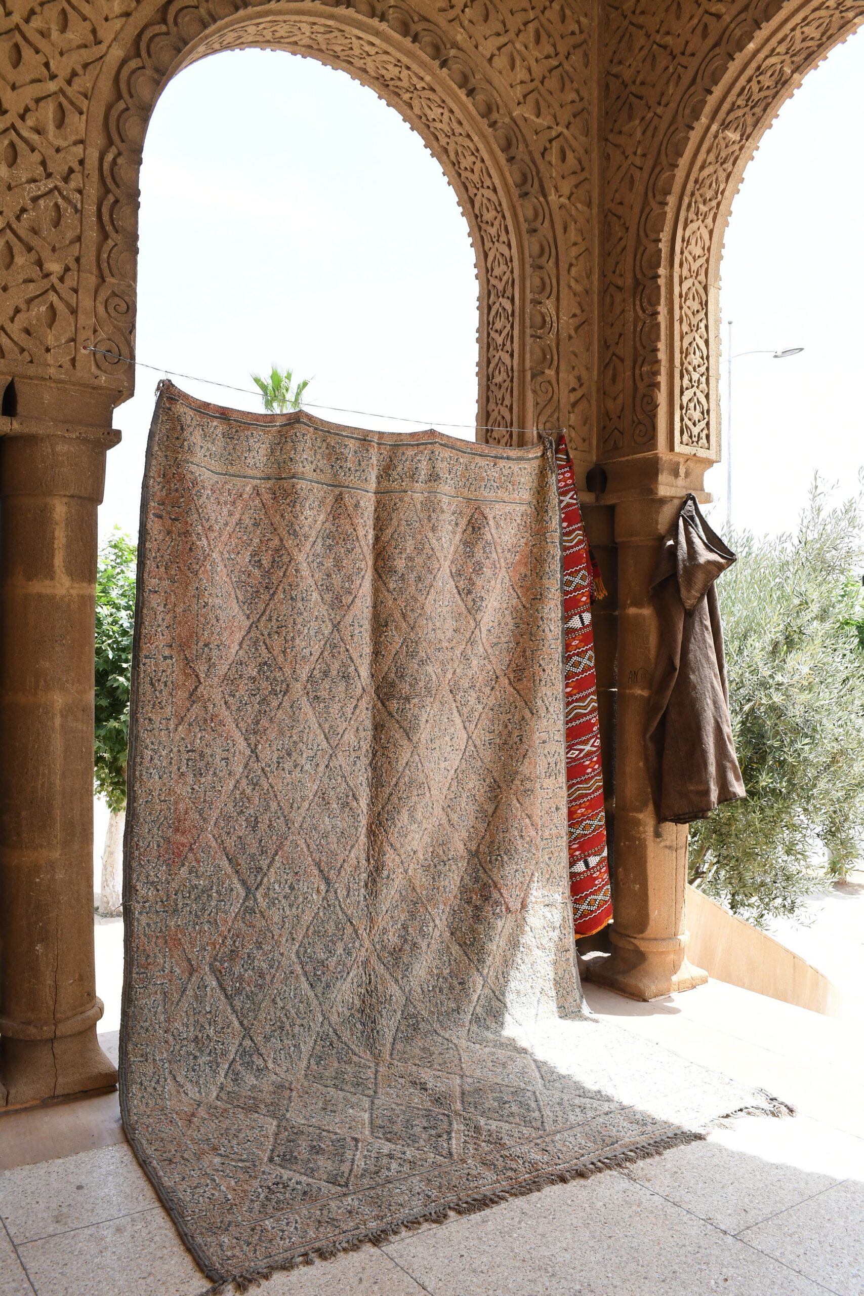 a large rug is hanging on a wall. il_fullxfull.6025858392_8jyq.jpg