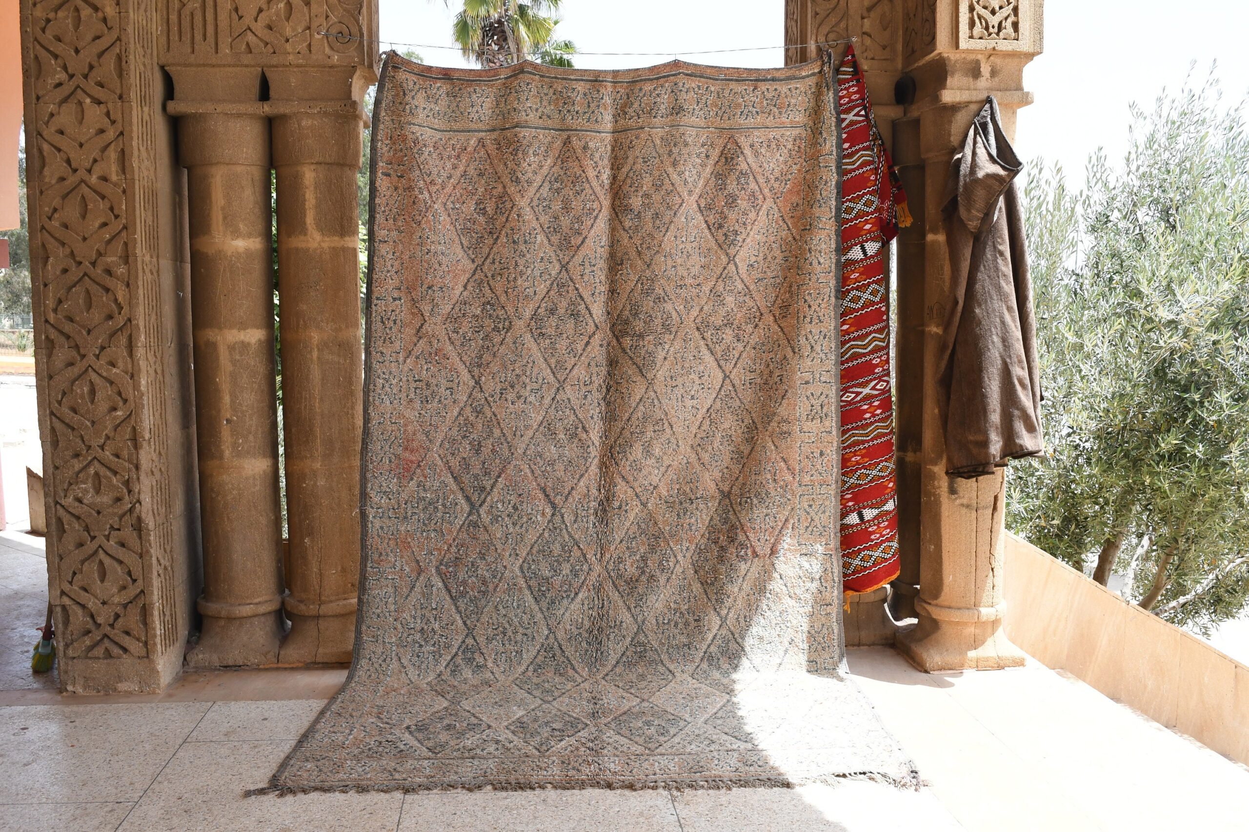 a rug hanging on a wall in a room. il_fullxfull.6025858770_dl9x.jpg