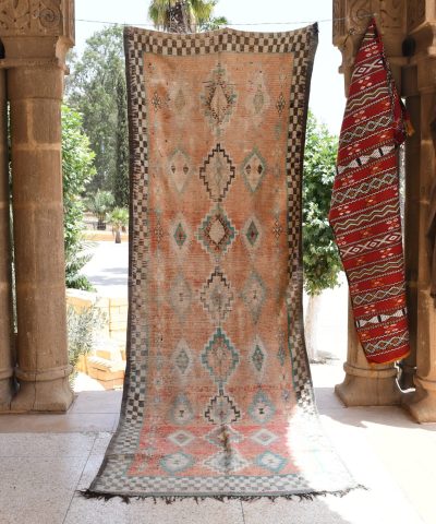 a rug is hanging on a wall in a room. il_fullxfull.6025860510_7hgj.jpg