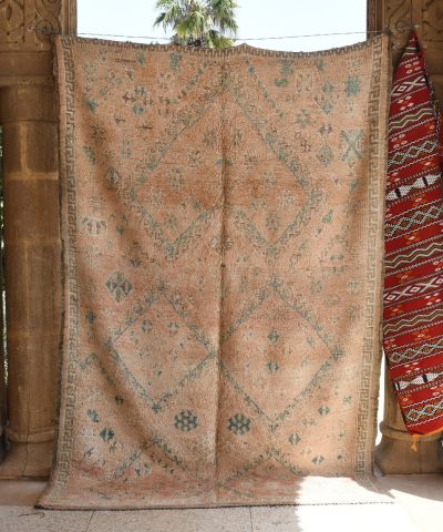 a moroccan rug hanging on a wall in a room. il_fullxfull.6025866930_kf8q.jpg