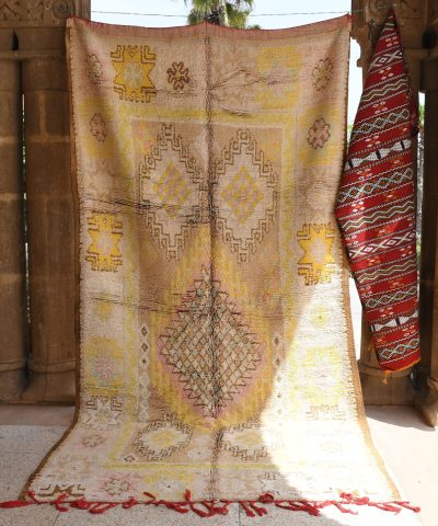 a rug hanging on a wall. il_fullxfull.6025876642_r4s5.jpg