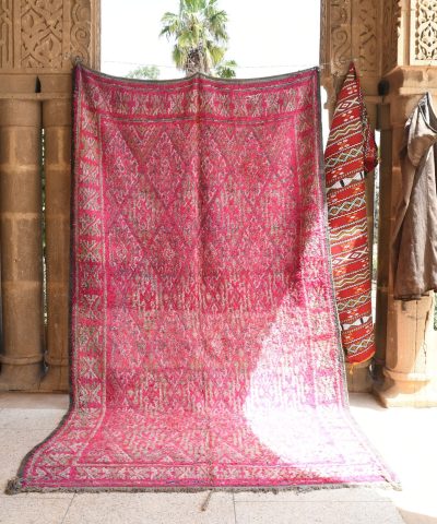 a pink and red rug hanging on a wall. il_fullxfull.6025879356_k37l.jpg