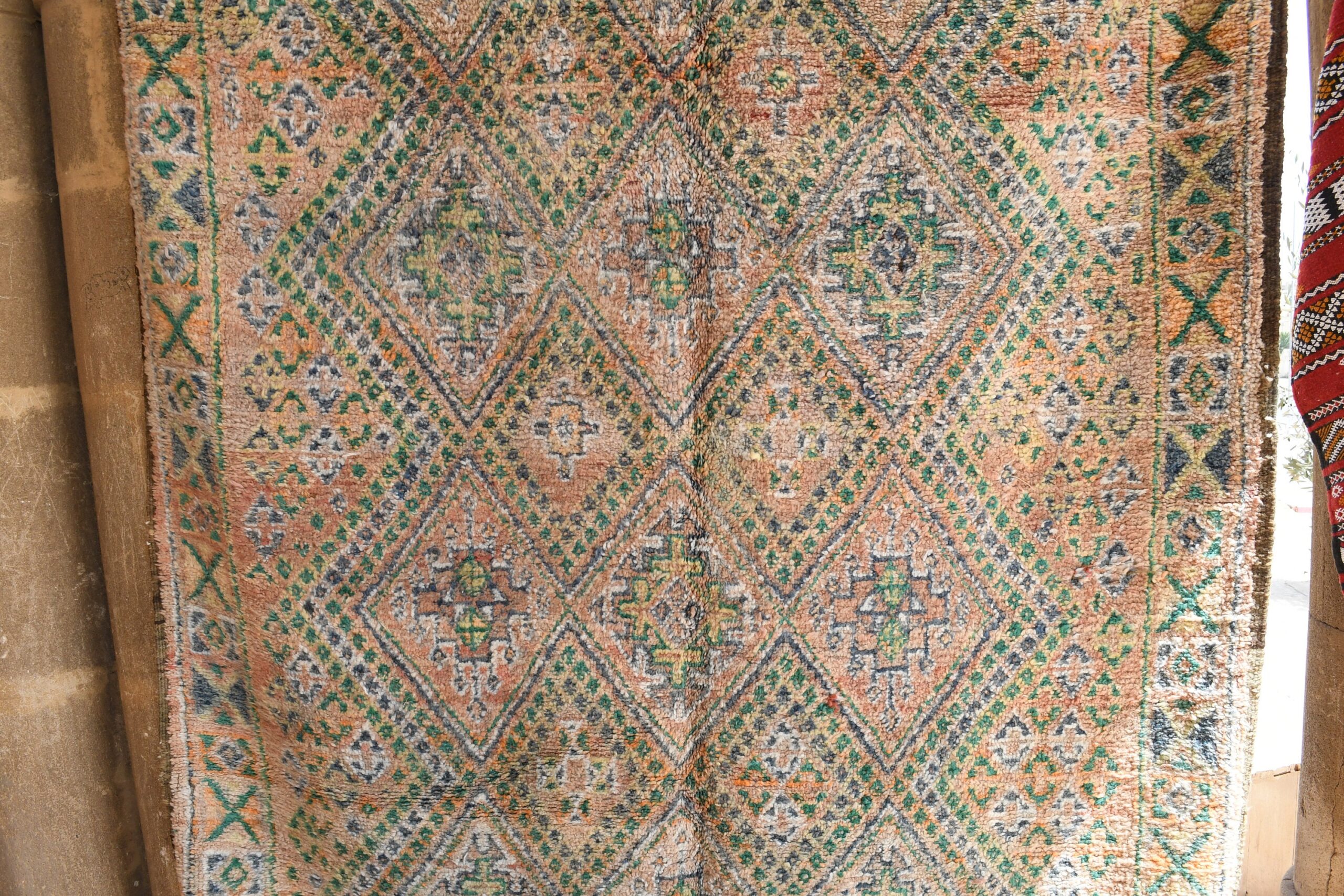 a rug hanging on a wall. il_fullxfull.6025882870_q0dc.jpg