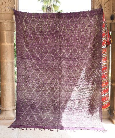 a purple rug hanging on a wall. il_fullxfull.6025889364_2bmi.jpg