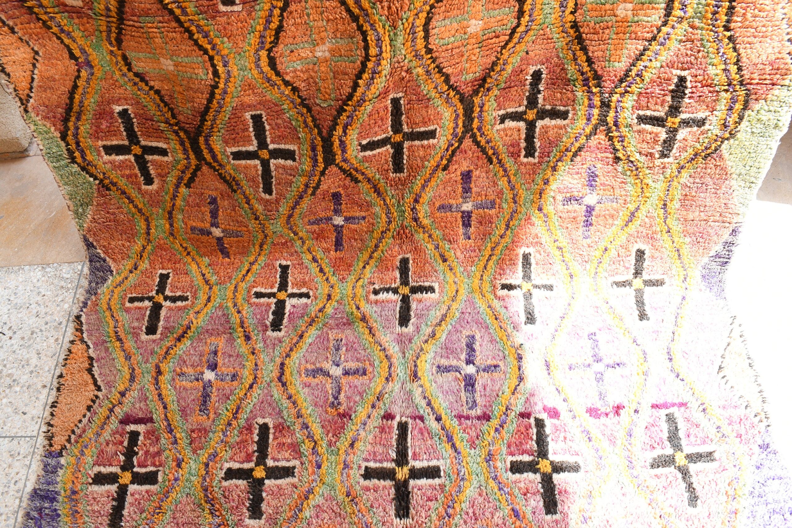 a colorful rug with a pattern on it. il_fullxfull.6025908288_8pwr.jpg