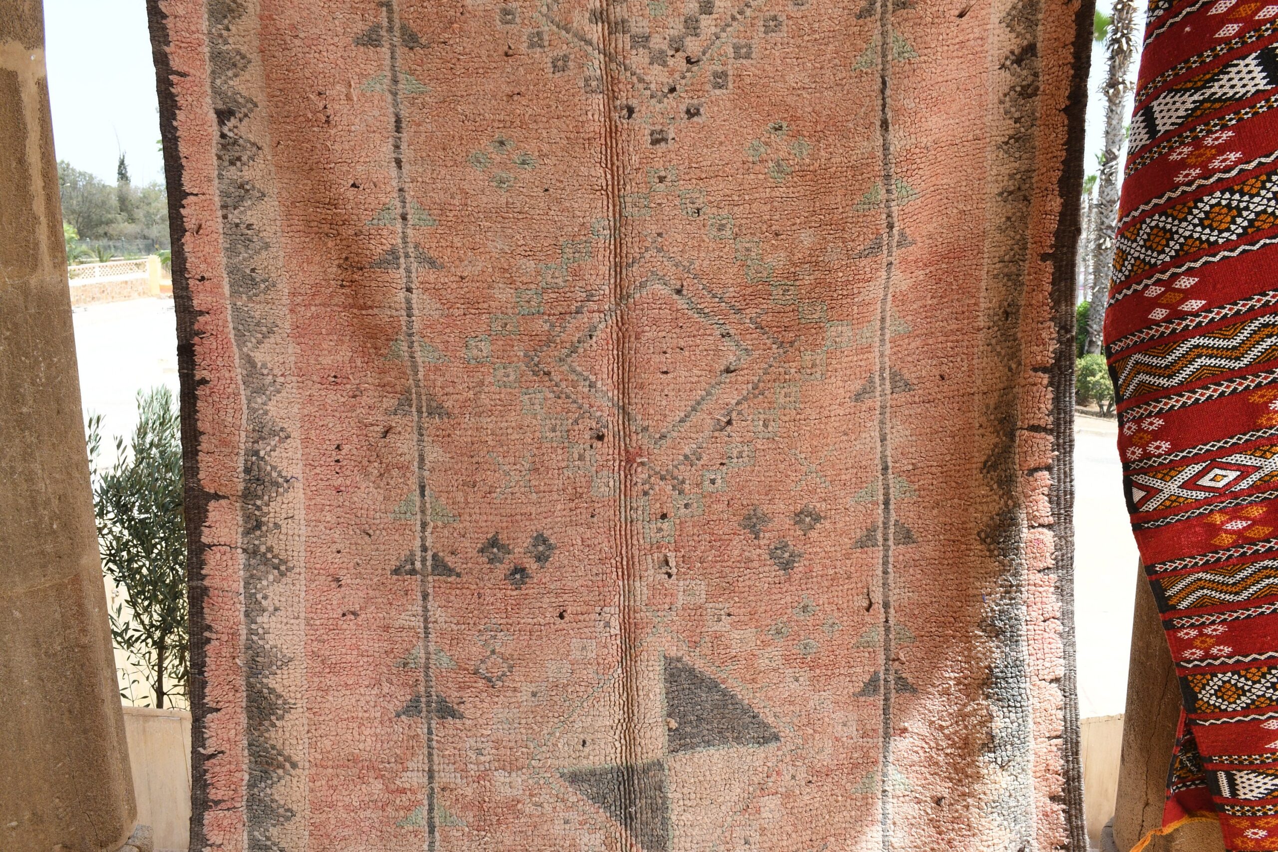 a woman standing in front of a rug. il_fullxfull.6025911092_afm1.jpg