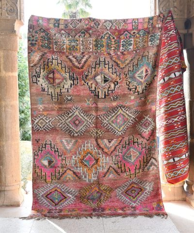 a colorful rug hanging on a wall. il_fullxfull.6028059986_m89h.jpg