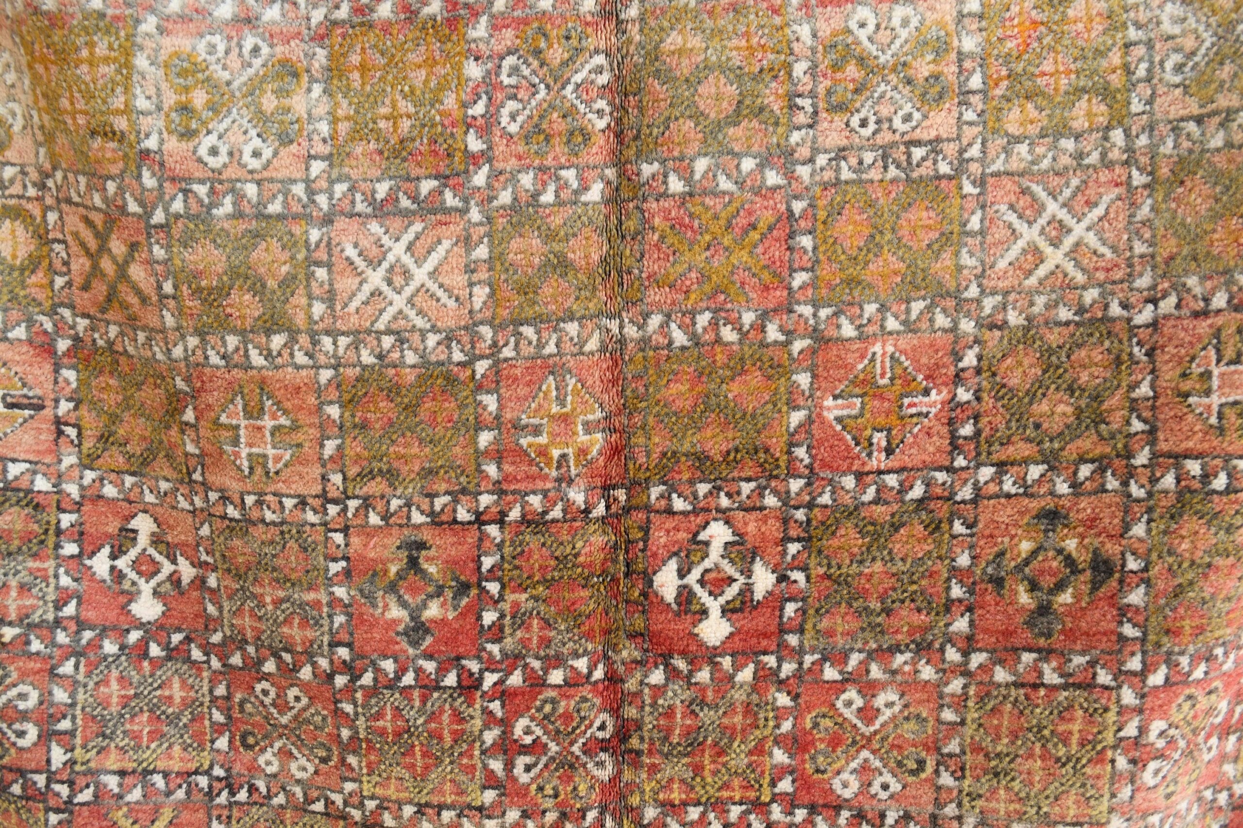 a large antique persian rug with geometric design. il_fullxfull.6028064396_2apv.jpg