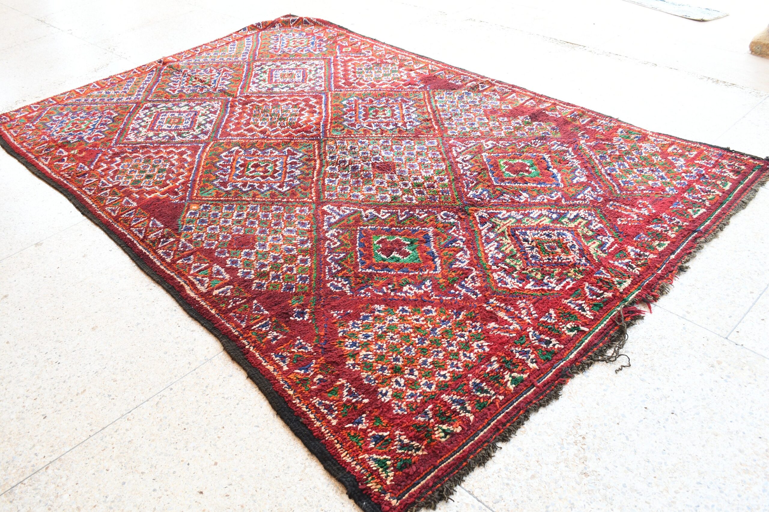 a red rug with a patch on the floor. il_fullxfull.6028065946_sbnz.jpg