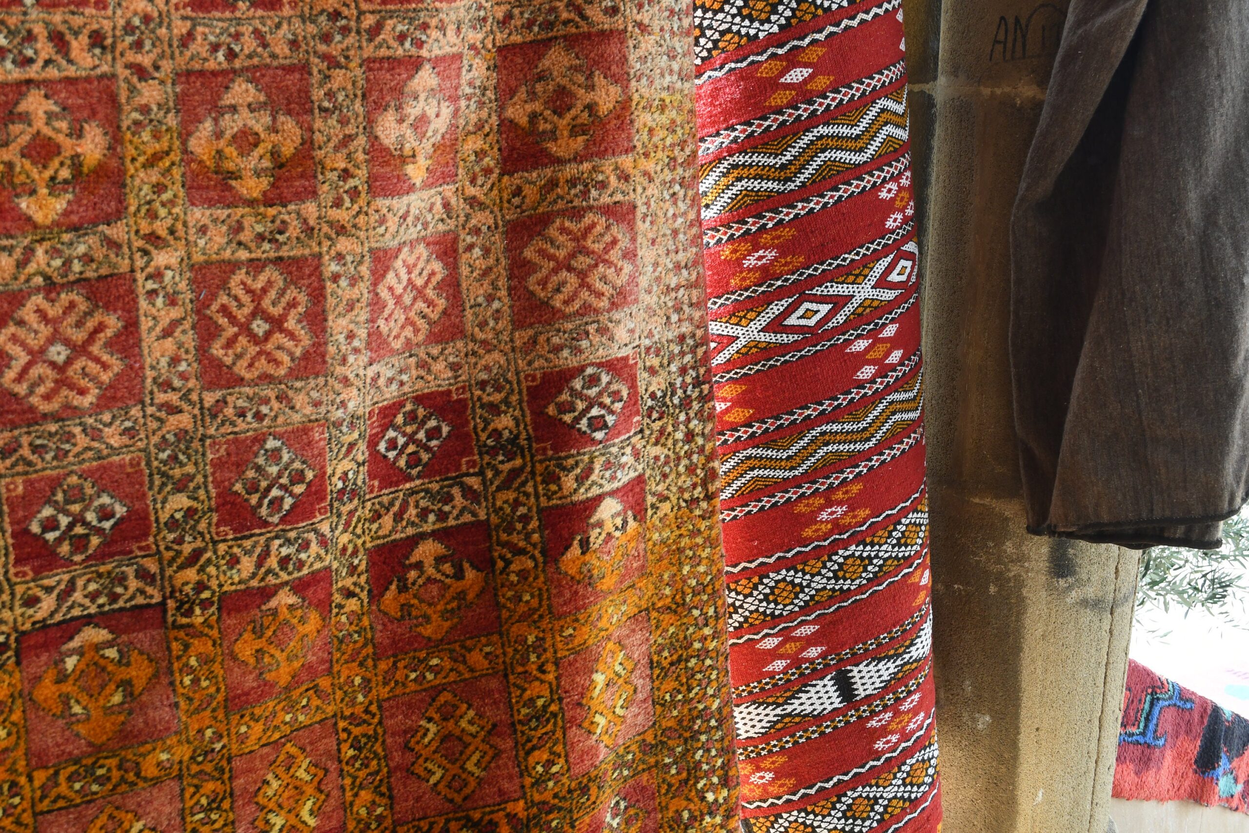 a red and brown rug. il_fullxfull.6028067002_hrbg.jpg