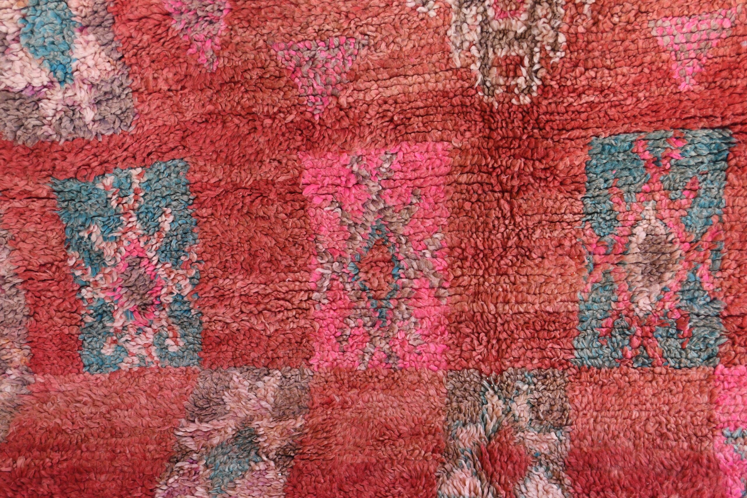 a red rug with a pattern of flowers. il_fullxfull.6028072036_t0zd.jpg