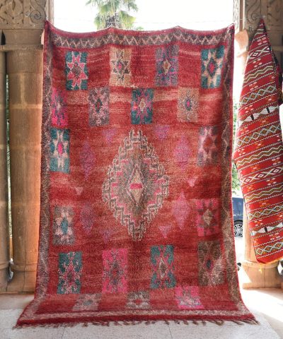 a red rug is hanging in a doorway. il_fullxfull.6028072218_15sl.jpg