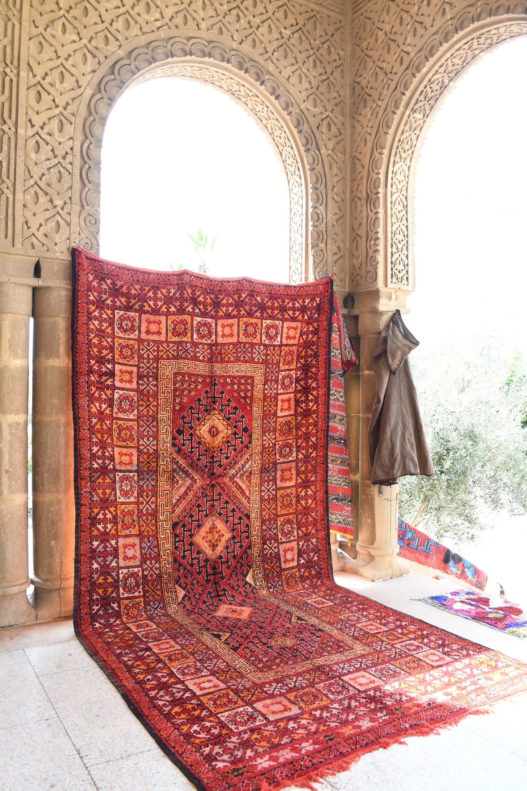 a rug in the courtyard of a house. il_fullxfull.6028075038_t100.jpg