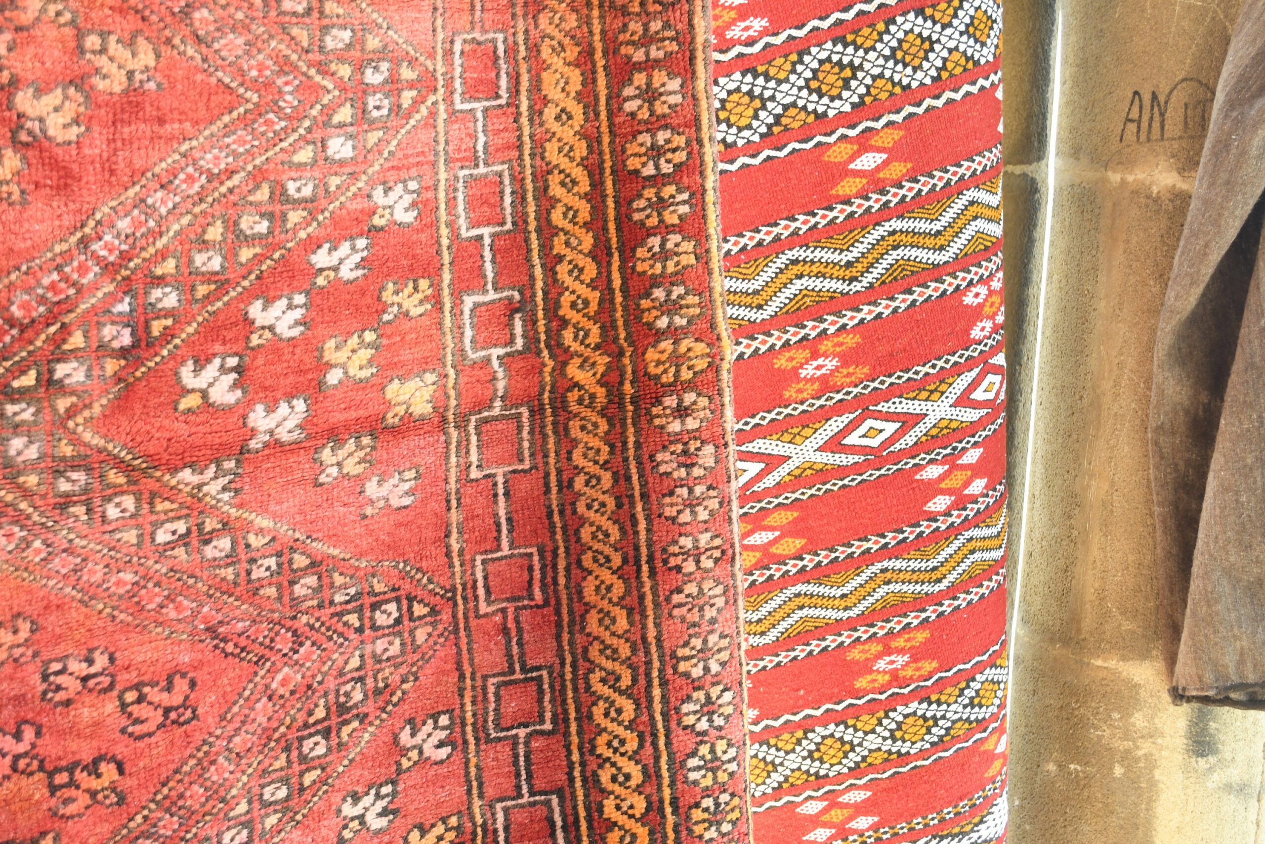 a red rug. il_fullxfull.6028085742_2fct.jpg