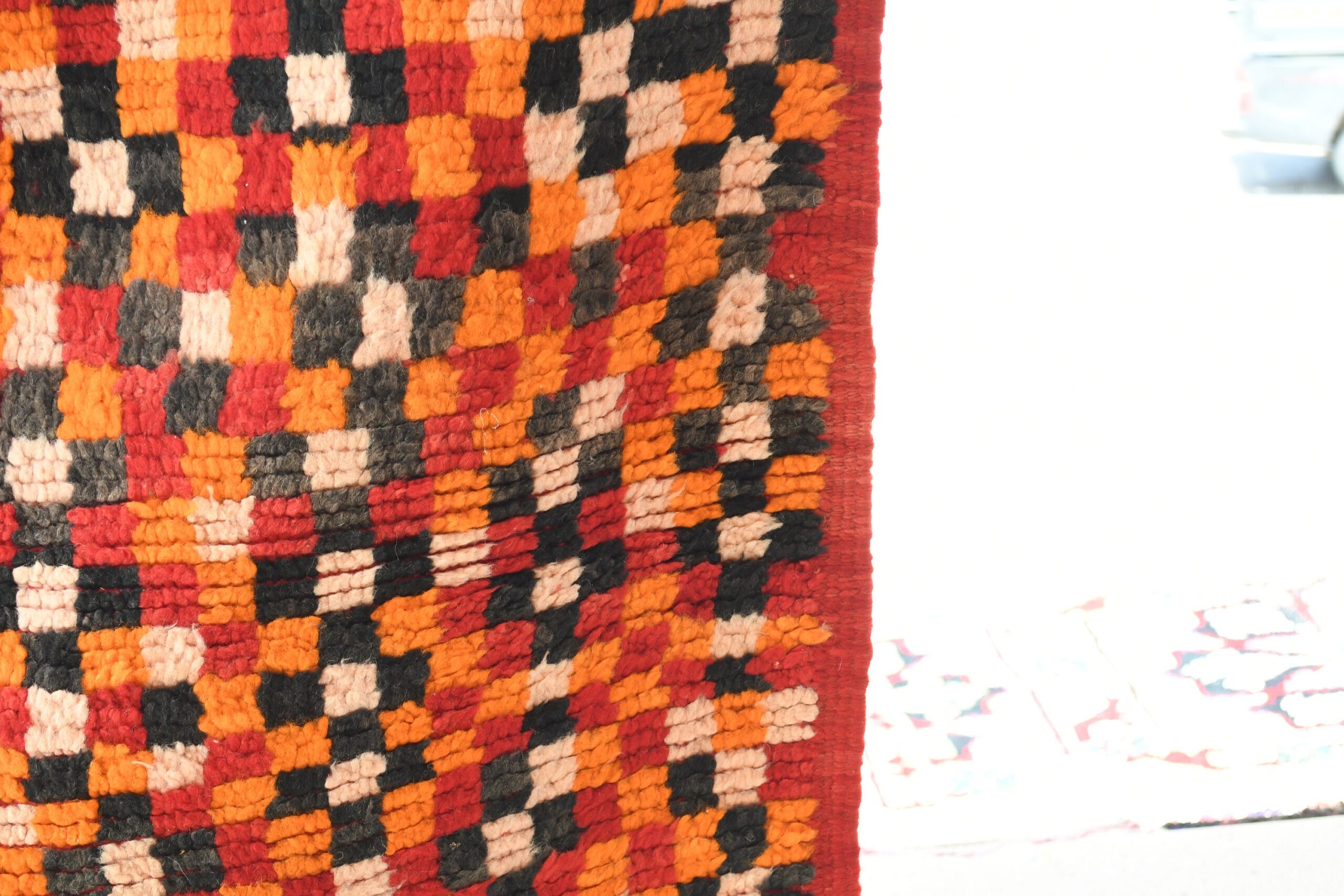 a red and black rug. il_fullxfull.6028090548_ir2y.jpg