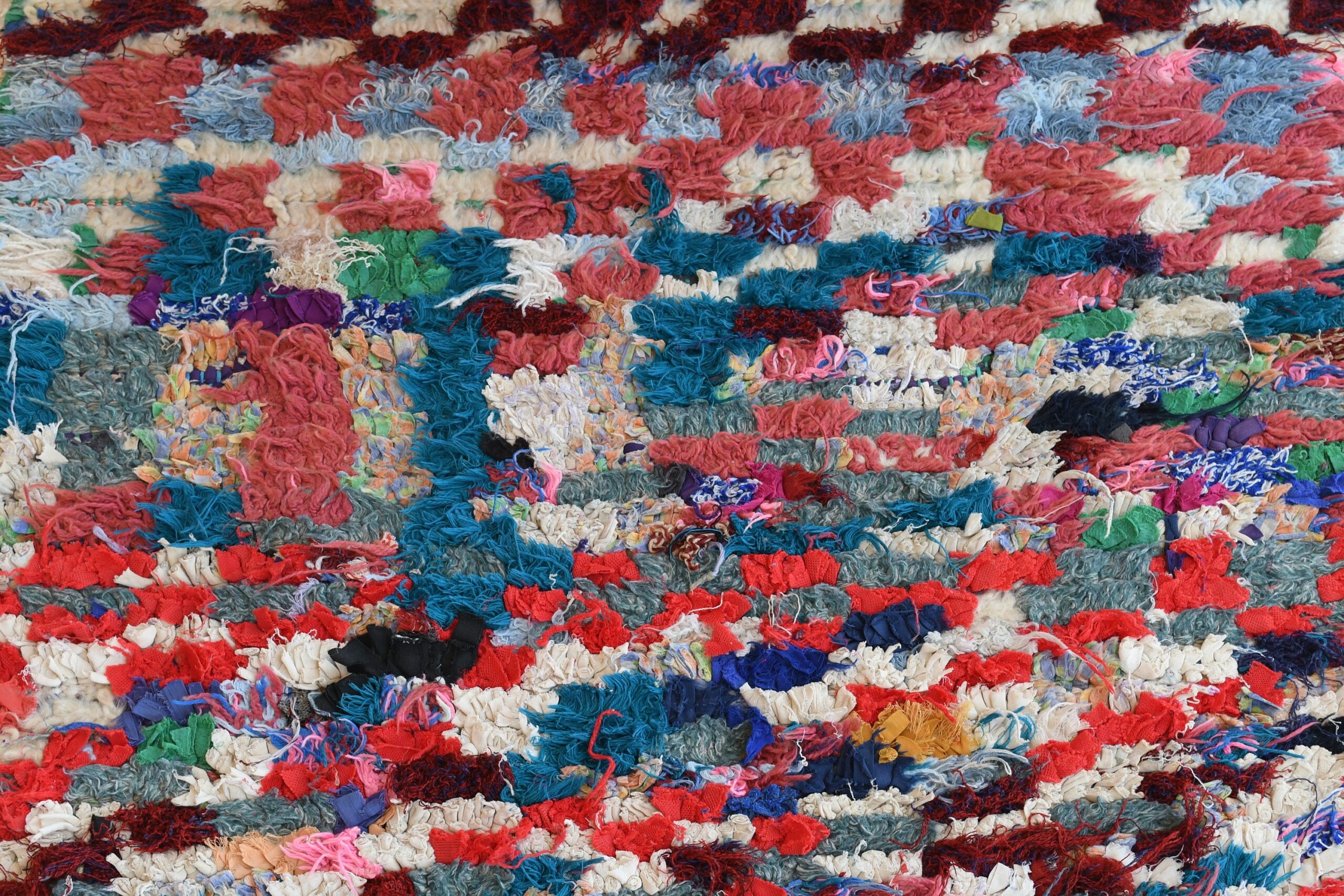 a rug with many different colored flowers. il_fullxfull.6028093650_nc6i.jpg