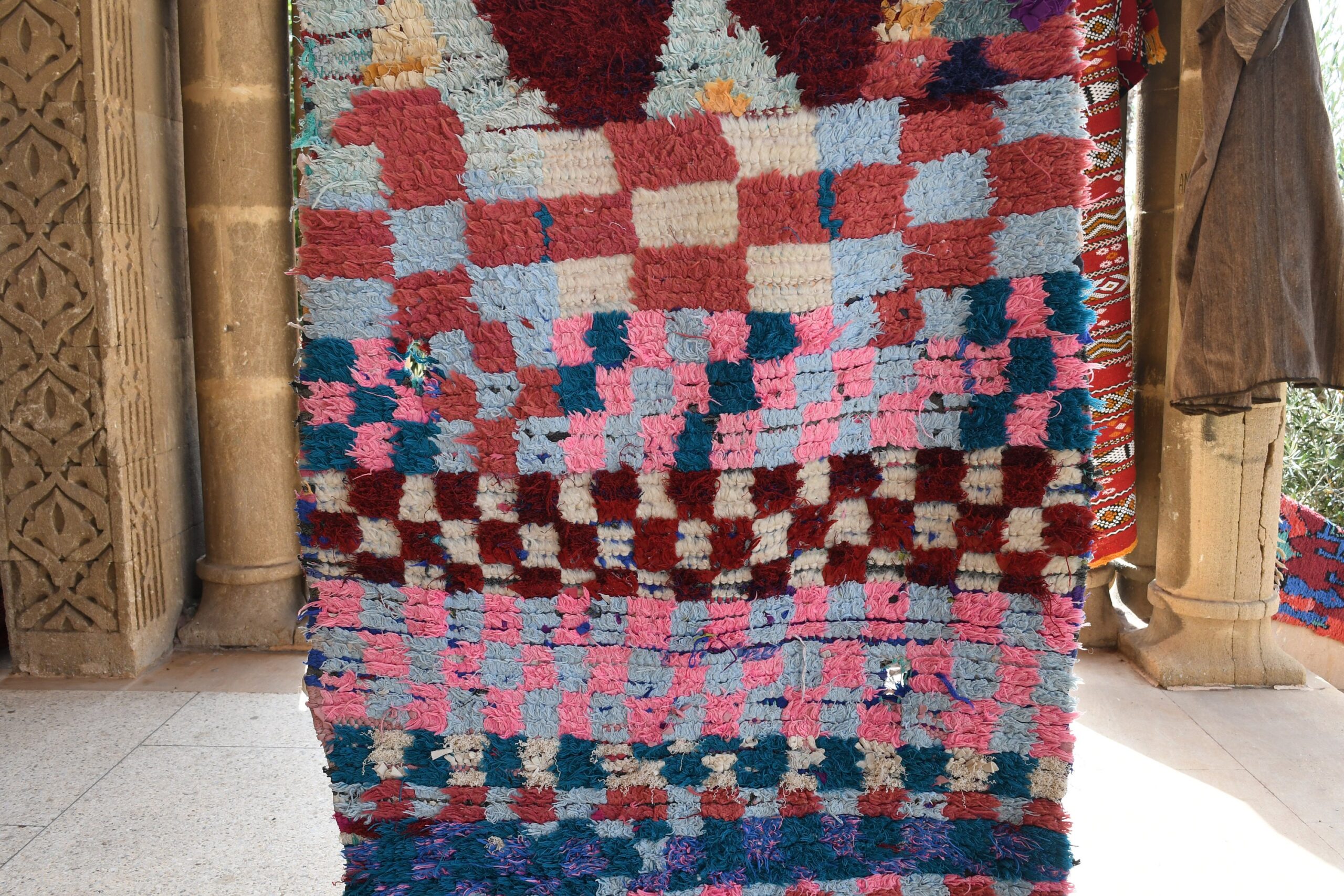 a colorful rug is on display in a room. il_fullxfull.6028094150_rmxc.jpg