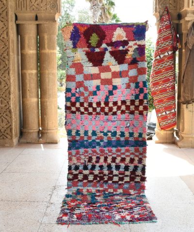 a colorful rug is on display in a room. il_fullxfull.6028094730_71ei.jpg