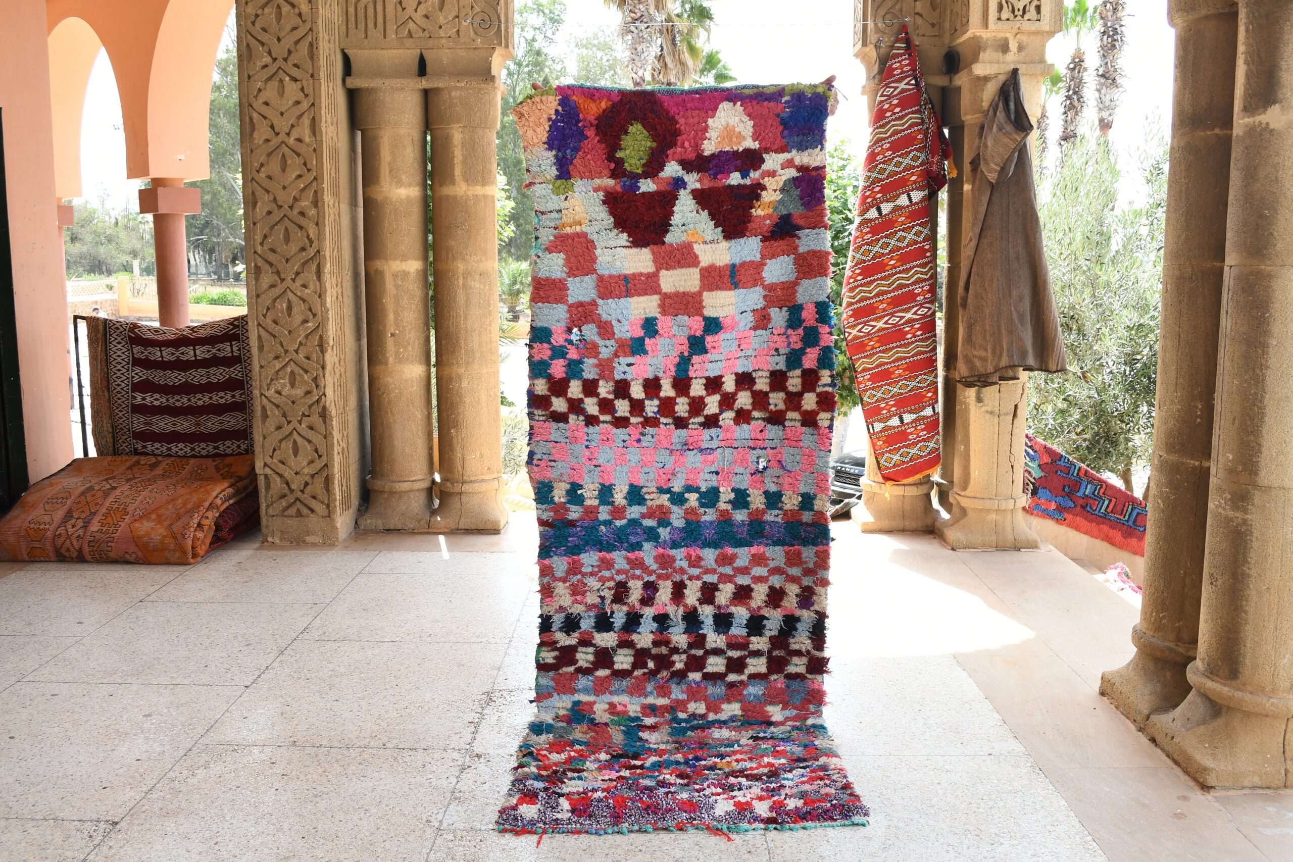 a colorful rug is on display in a room. il_fullxfull.6028094730_71ei.jpg