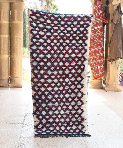 a colorful rug hanging on a wall. il_fullxfull.6028108912_r2oo.jpg