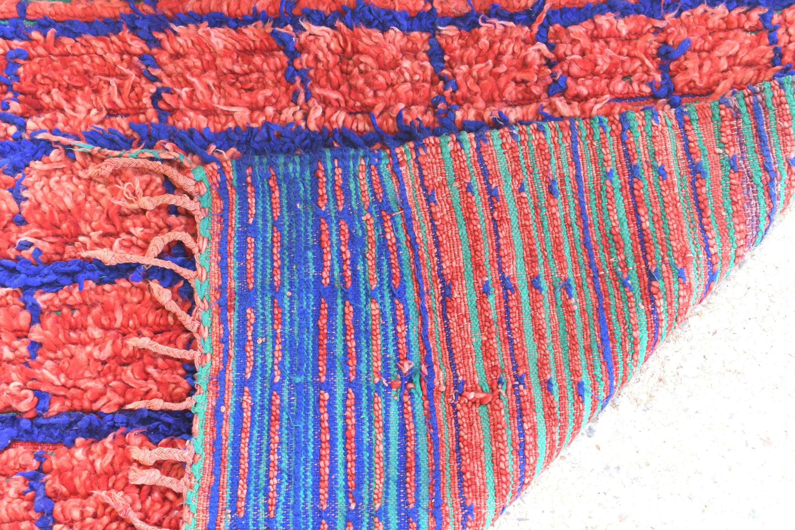 a red and blue rug with fringes. il_fullxfull.6028111674_rsaz.jpg