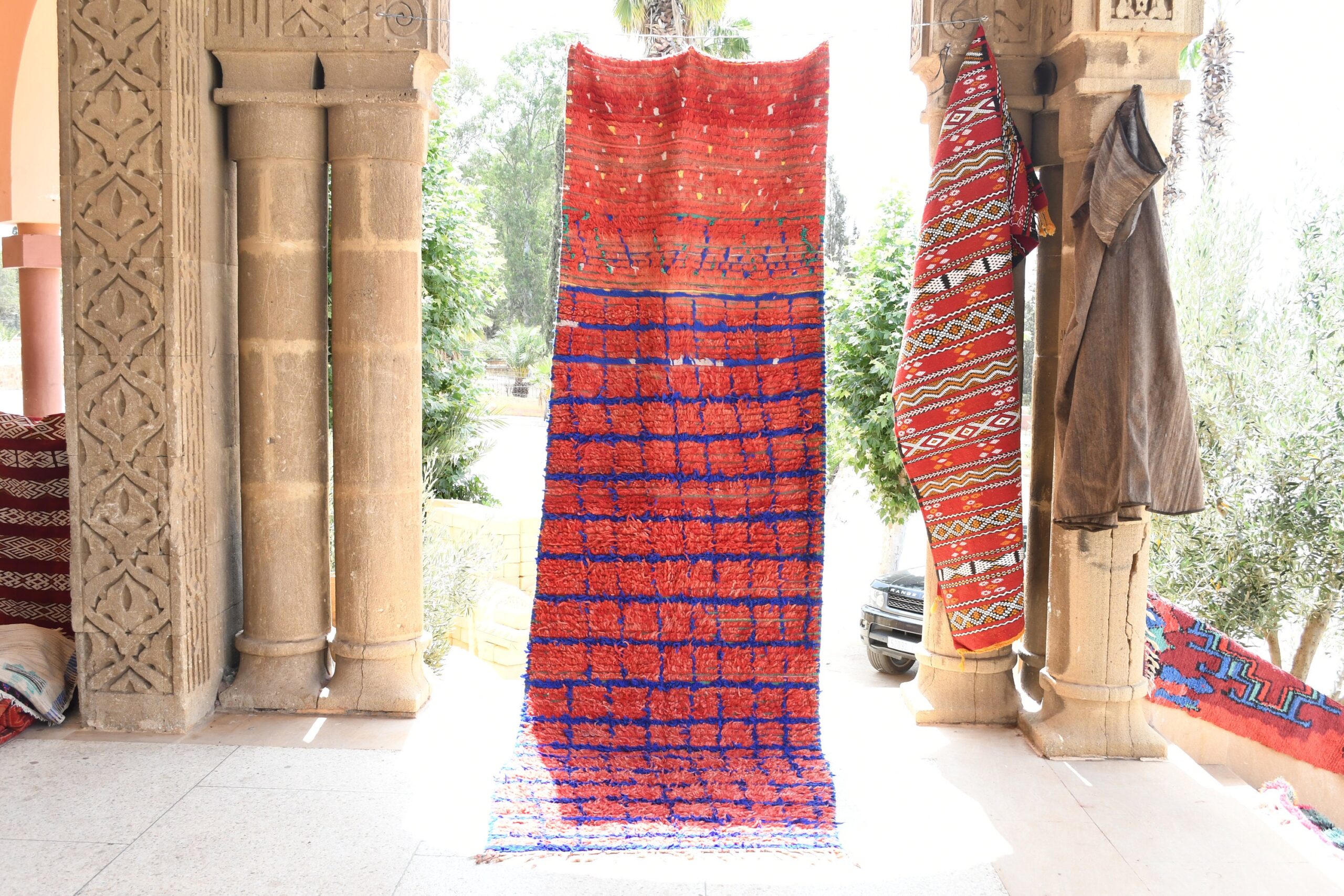 a red and blue dress hanging on a wall. il_fullxfull.6028111848_4i0l.jpg