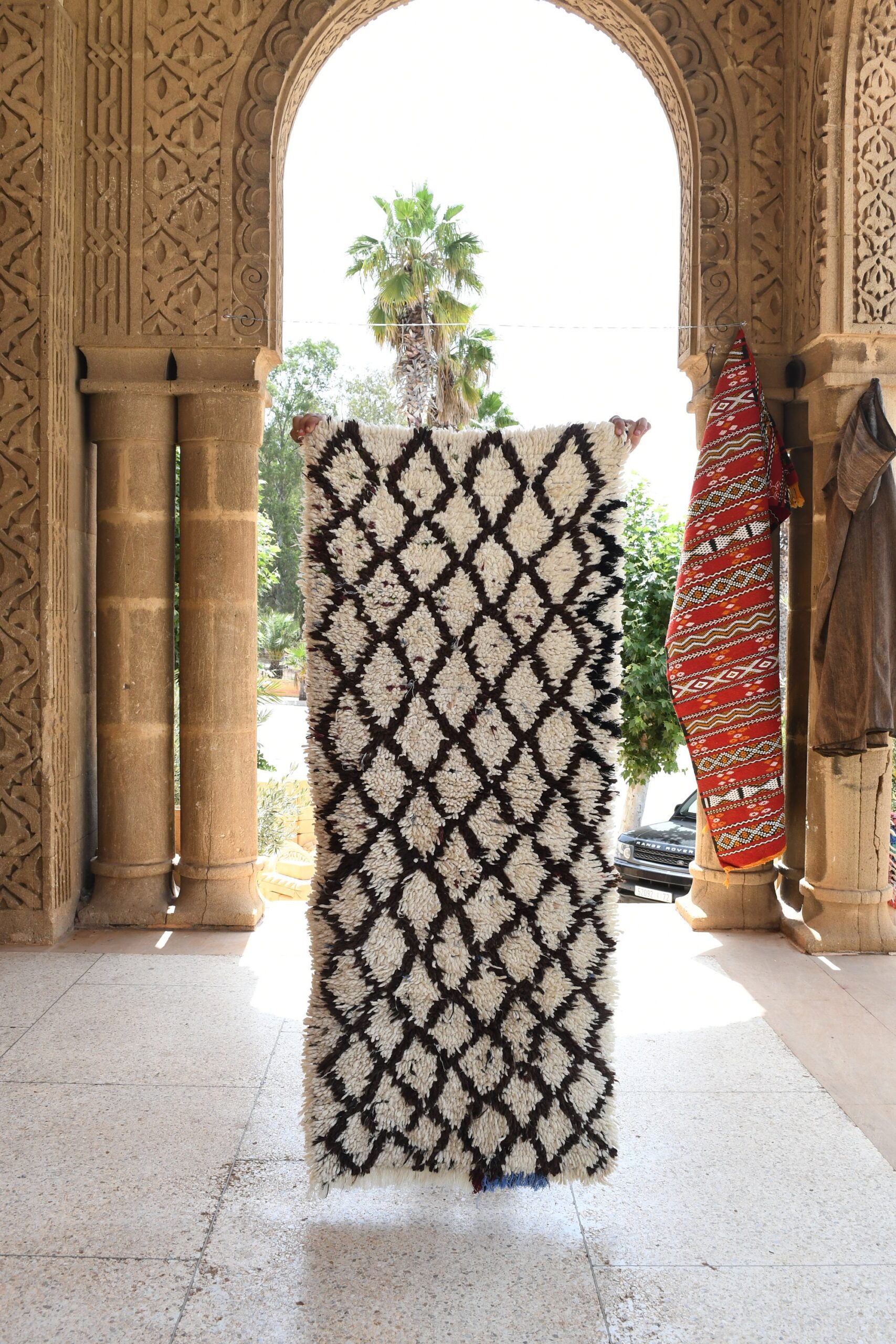 a large rug in the entrance to the palace. il_fullxfull.6028114302_it6r.jpg