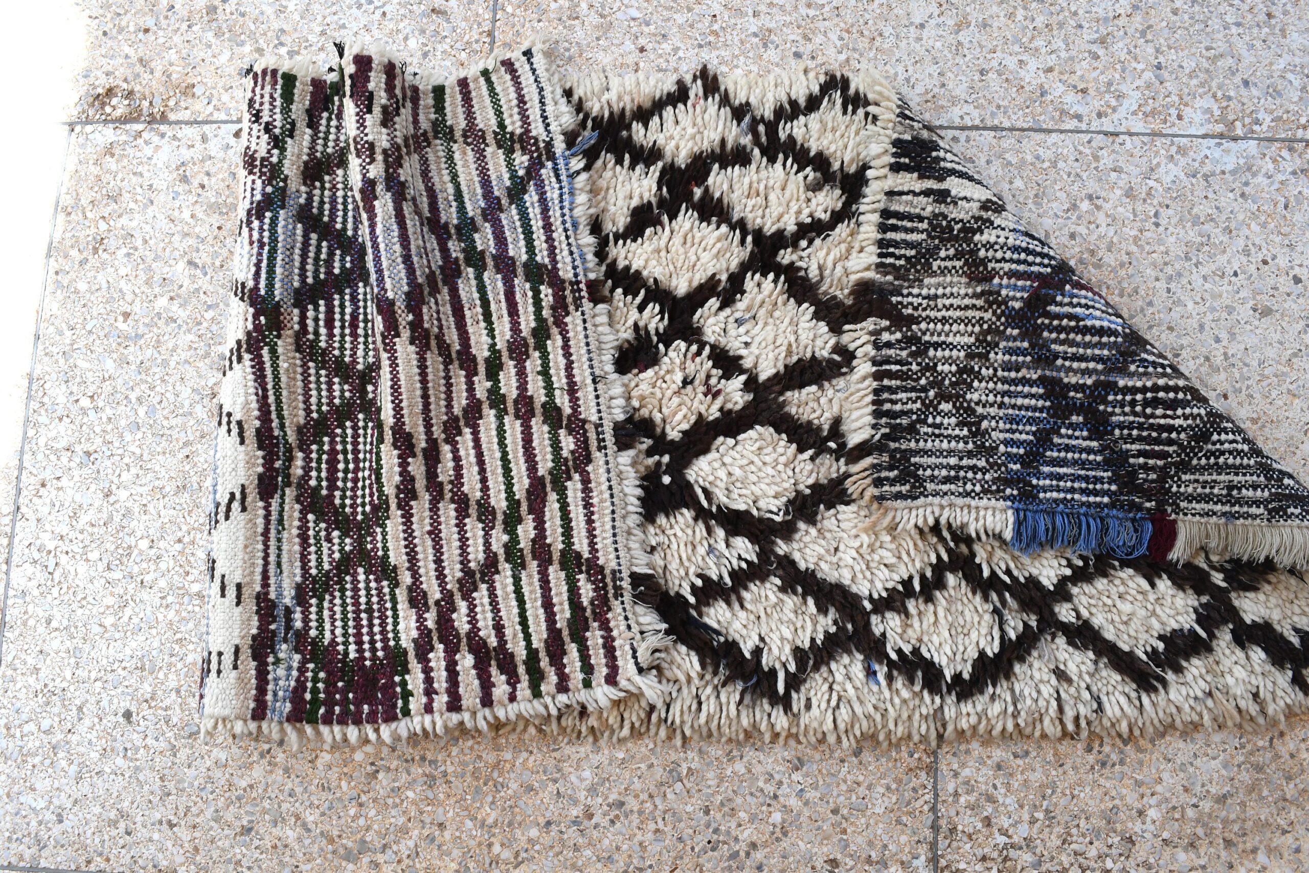 a rug on the ground. il_fullxfull.6028114554_79a3.jpg