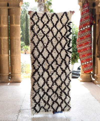 a large rug is hanging on a wall. il_fullxfull.6028114638_e7yf.jpg