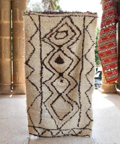 a tall rug is on display in a room. il_fullxfull.6028115964_bge4.jpg