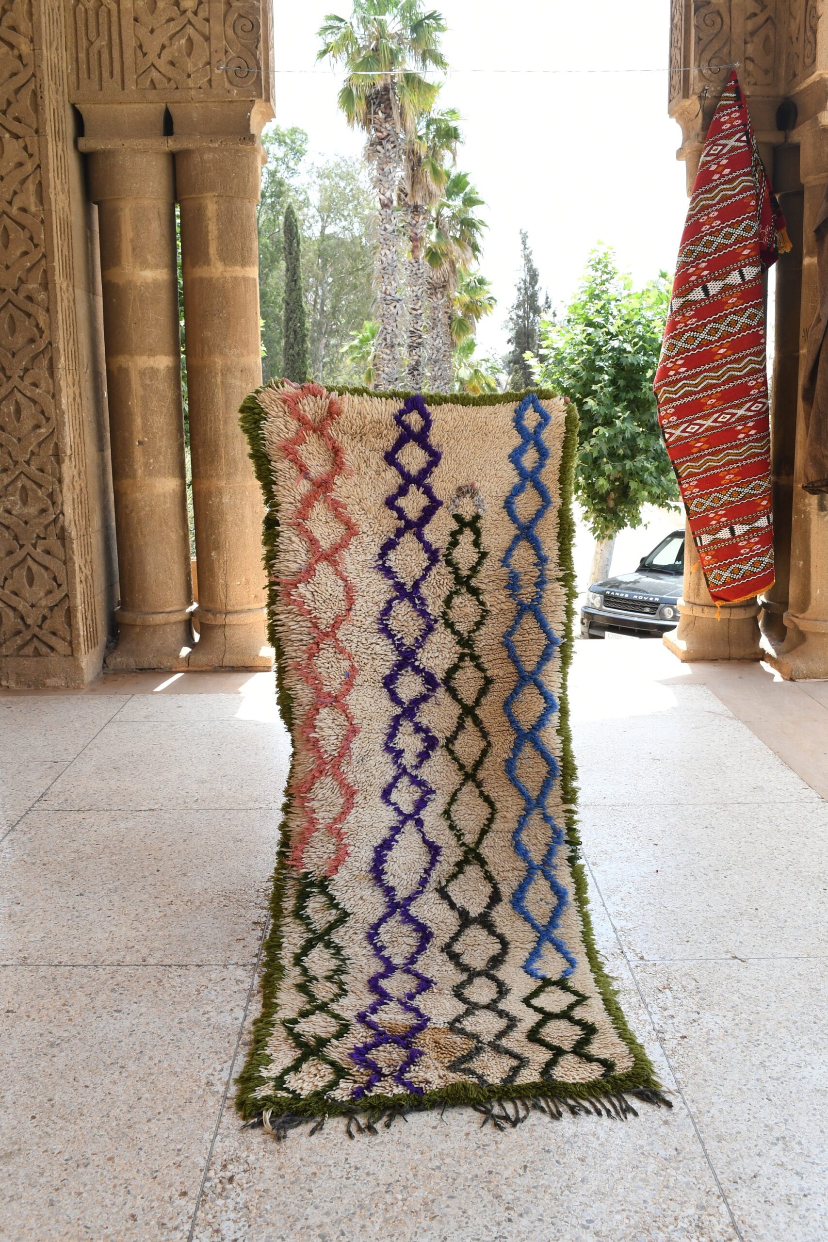 a large rug with a pattern of flowers. il_fullxfull.6028129146_lqw4.jpg