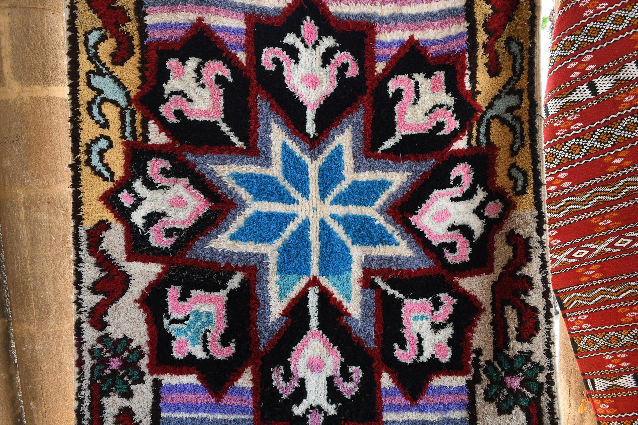 a colorful rug with a flower design on it. il_fullxfull.6028206062_4m3t.jpg