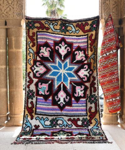 a colorful rug hanging on a wall. il_fullxfull.6028206758_l7q8.jpg