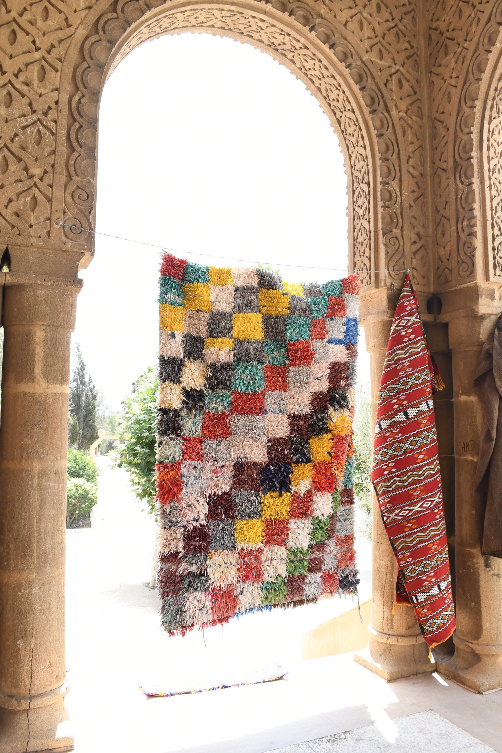 a colorful rug hanging on a wall. il_fullxfull.6028211186_dt01.jpg
